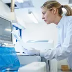 Researcher performing testing